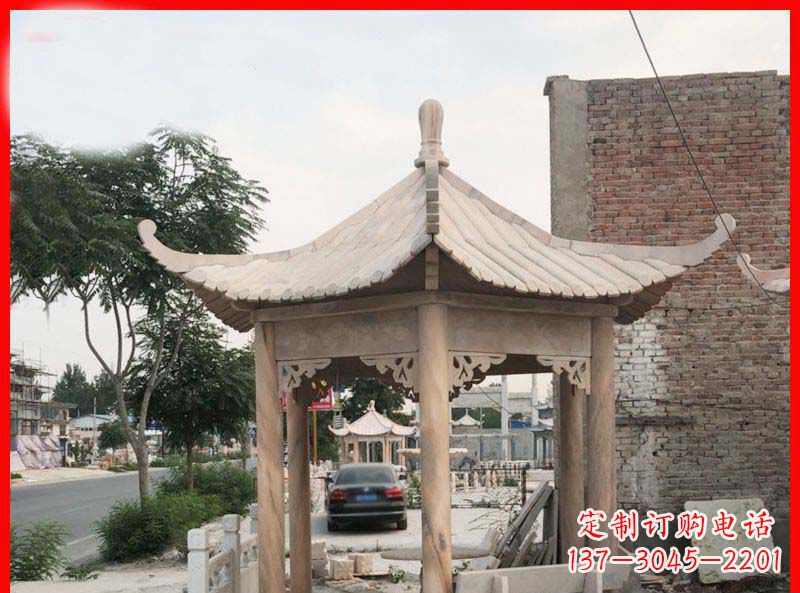 厦门公园晚霞红六角石凉亭雕塑